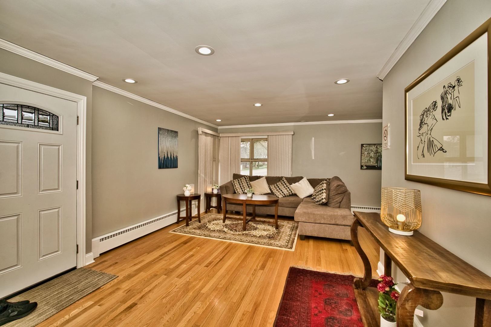 5200 Madison Street Skokie, IL 60077 - Photo 27 of 53 a living room with furniture and wooden floor