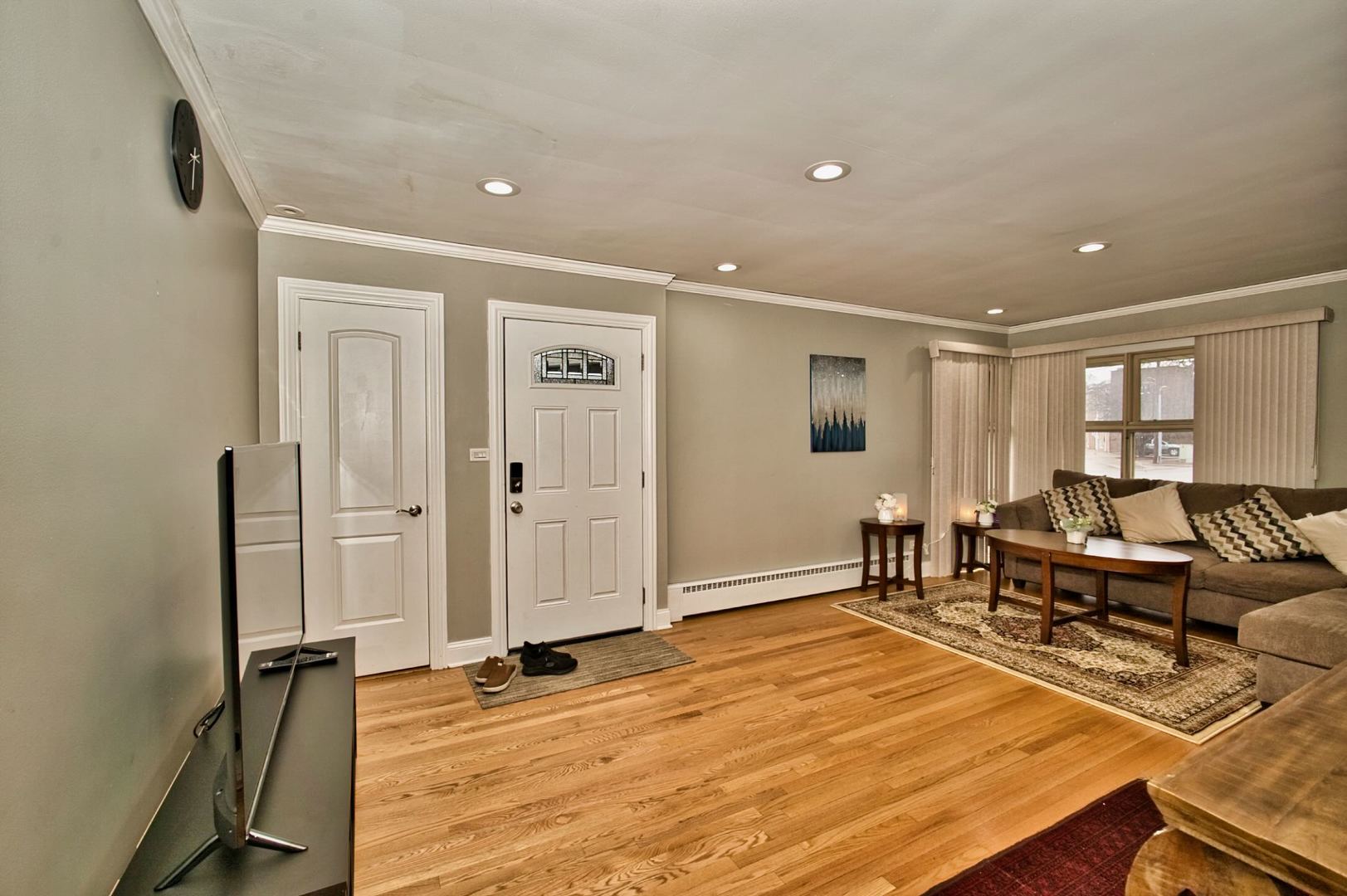 5200 Madison Street Skokie, IL 60077 - Photo 28 of 53 a view of a livingroom with furniture and wooden floor