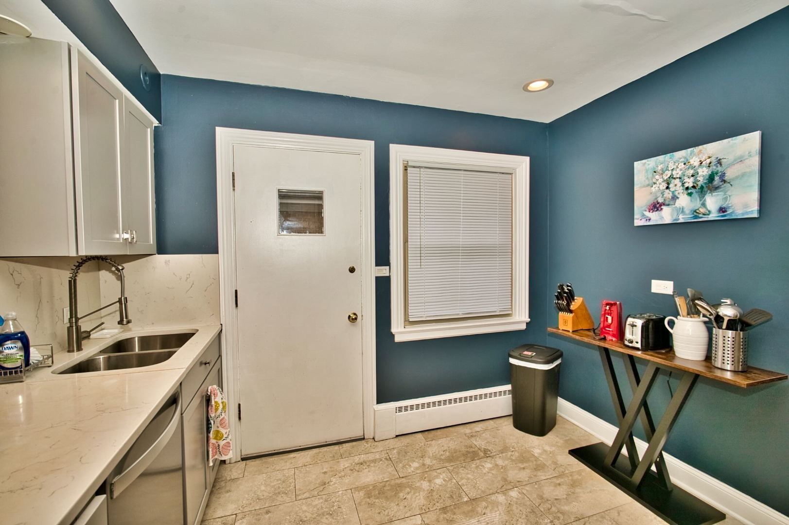 5200 Madison Street Skokie, IL 60077 - Photo 33 of 53 a kitchen with a refrigerator and sink