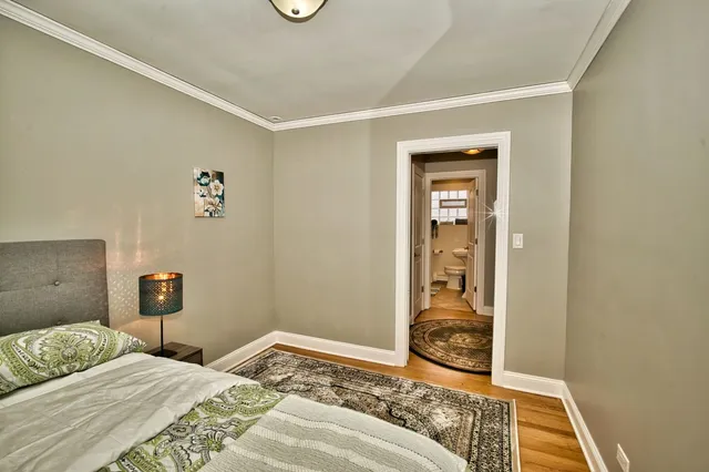 a bathroom with a toilet and shower