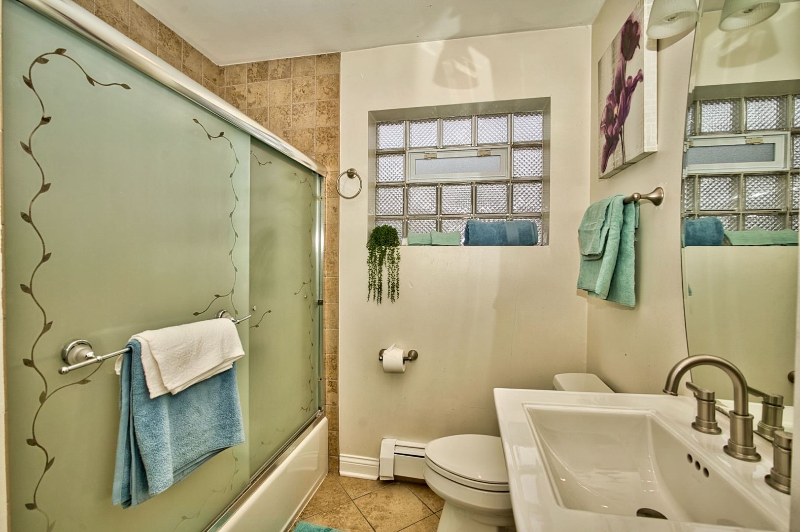 5200 Madison Street Skokie, IL 60077 - Photo 38 of 53 a bathroom with a sink toilet and shower