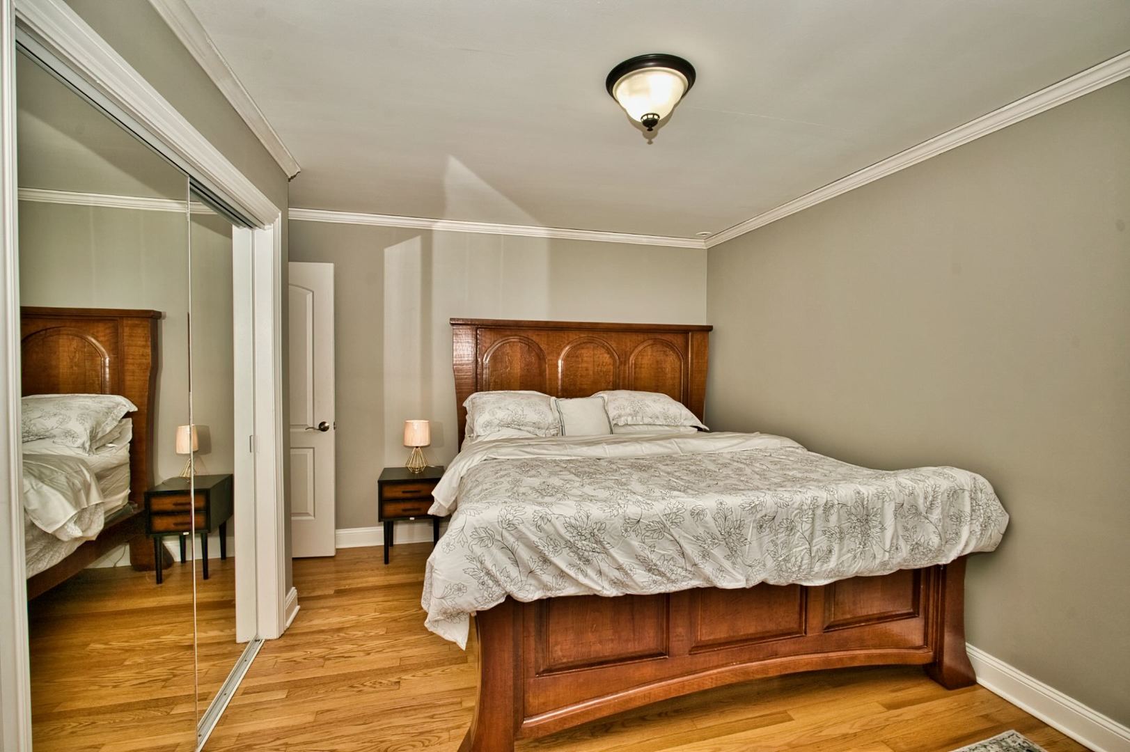 5200 Madison Street Skokie, IL 60077 - Photo 43 of 53 a bedroom with a bed and a view of walk in closet