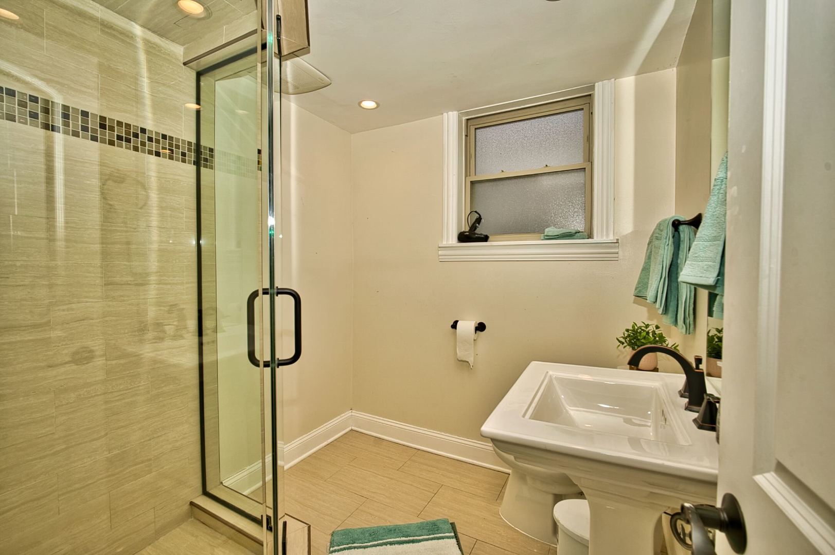 5200 Madison Street Skokie, IL 60077 - Photo 44 of 53 a bathroom with a sink and a shower