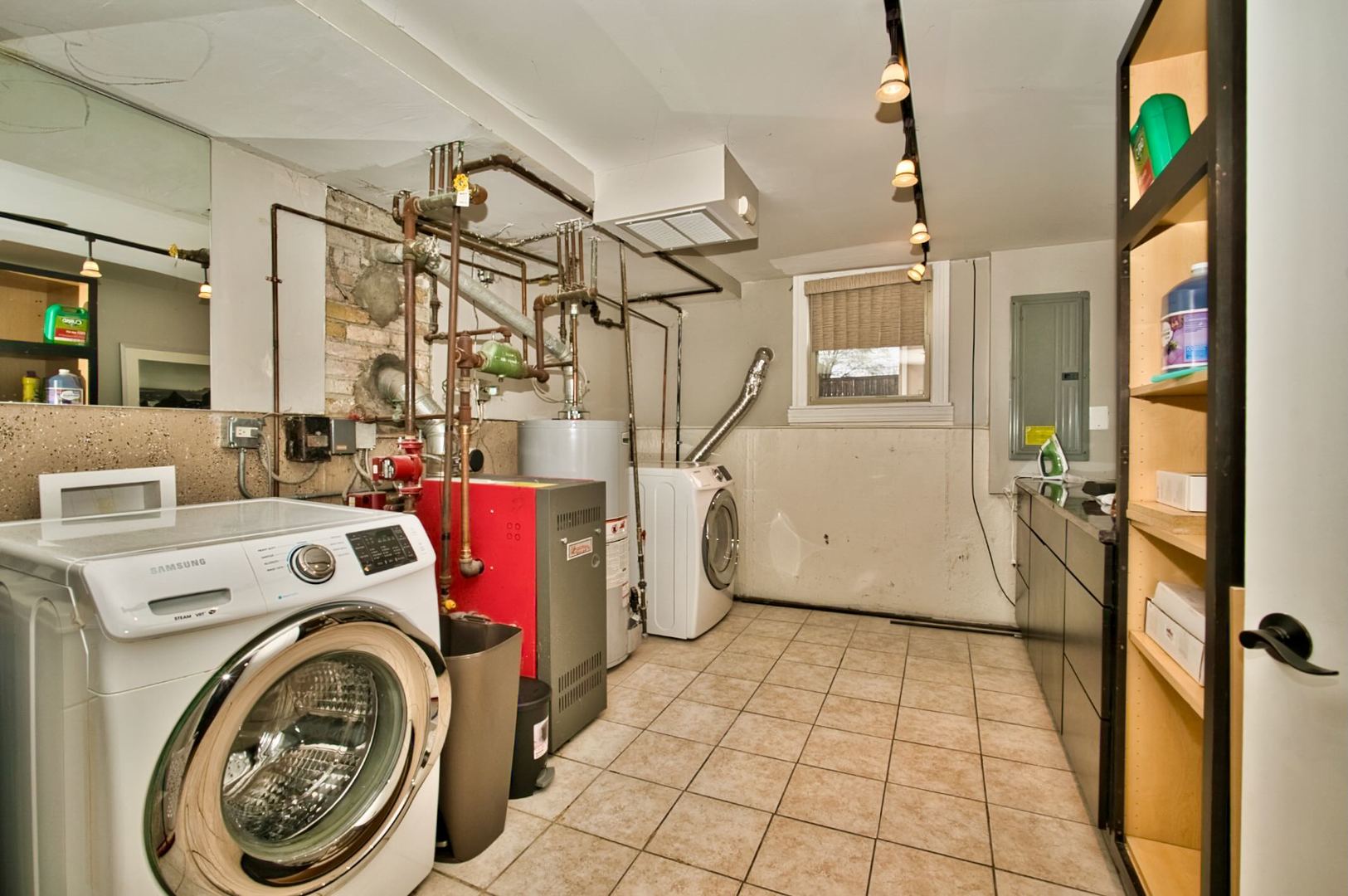 5200 Madison Street Skokie, IL 60077 - Photo 48 of 53 a utility room with dryer and washer