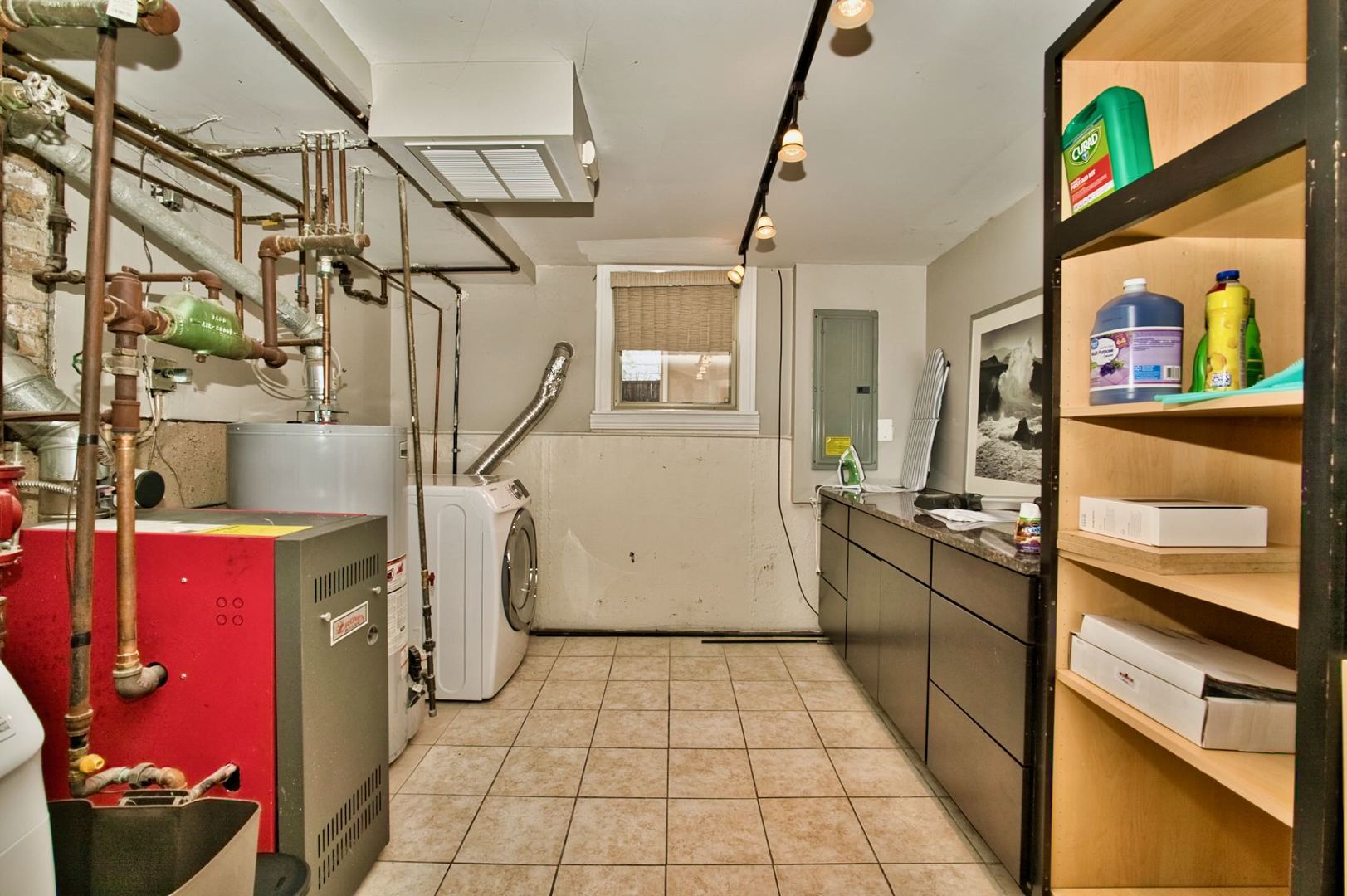 5200 Madison Street Skokie, IL 60077 - Photo 49 of 53 a utility room with cabinets