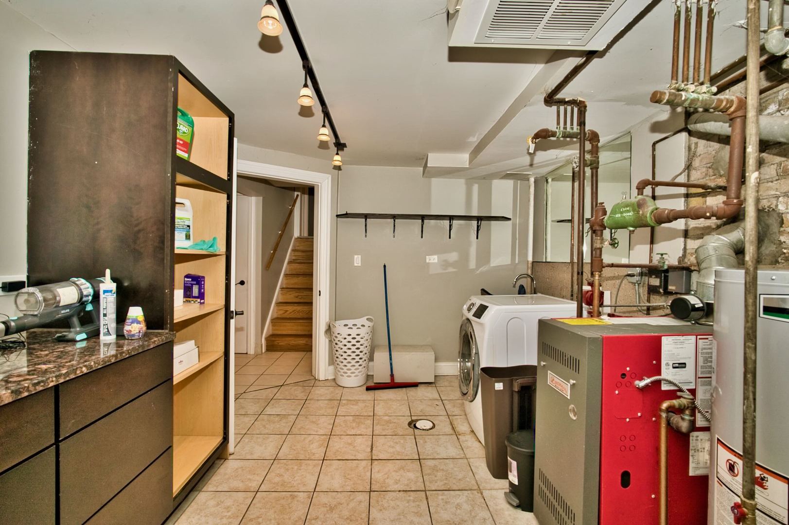 5200 Madison Street Skokie, IL 60077 - Photo 50 of 53 a kitchen with refrigerator and cabinets
