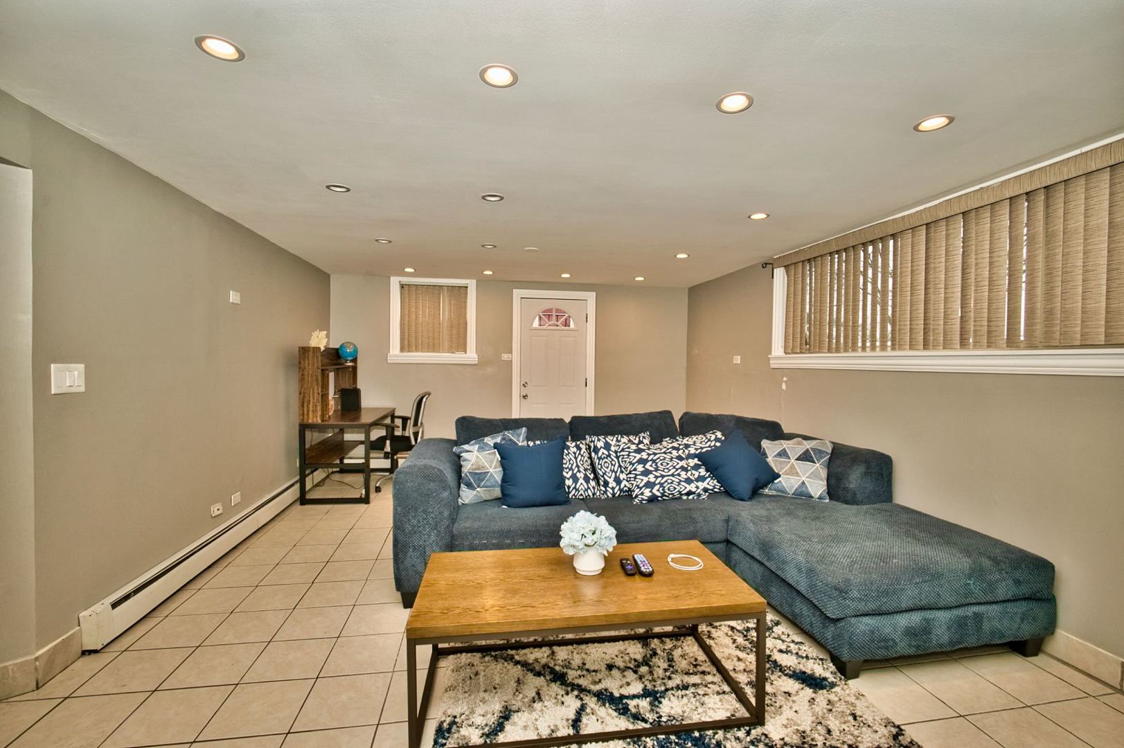 5200 Madison Street Skokie, IL 60077 - Photo 51 of 53 a living room with furniture and a table