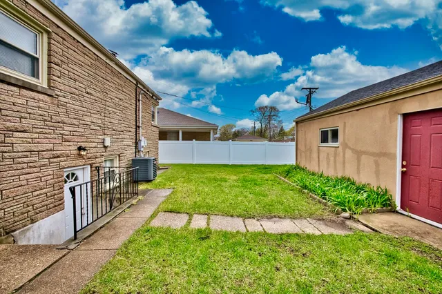 a view of a backyard with a garden
