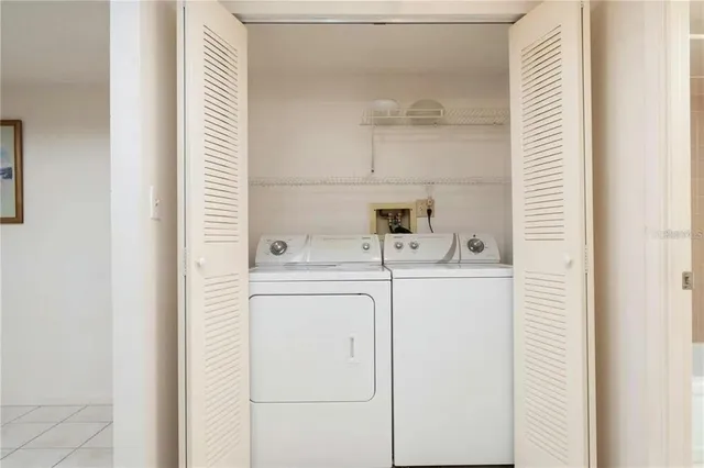 a view of an outdoor space with tennis court