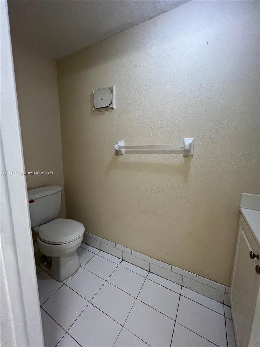 8600 Southwest 109th Avenue, Unit 4209 Miami, FL 33173 - Photo 5 of 15 a bathroom with a toilet and a shower