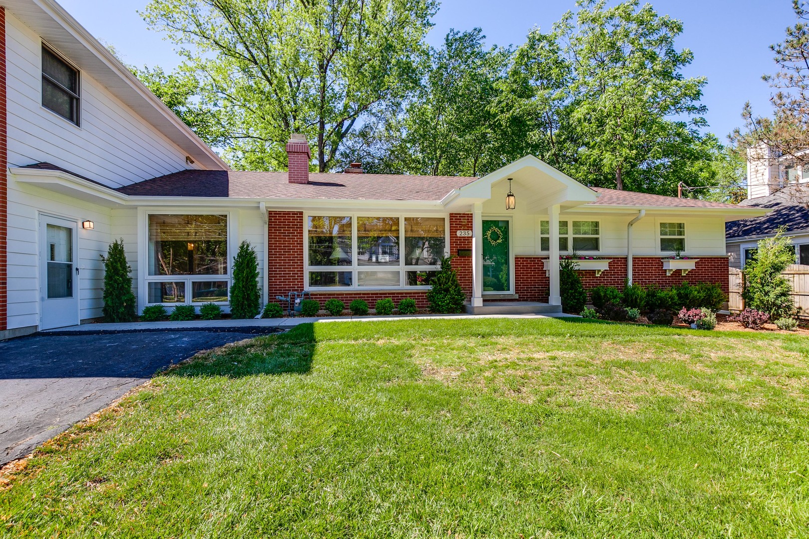 235 Waverly Road Barrington, IL 60010 - Photo 2 of 26 a front view of a house with a garden