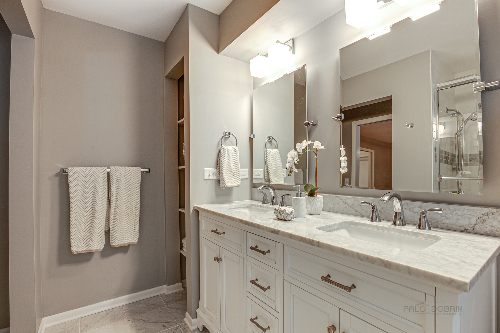 235 Waverly Road Barrington, IL 60010 - Photo 16 of 26 a bathroom with a double vanity sink and a mirror