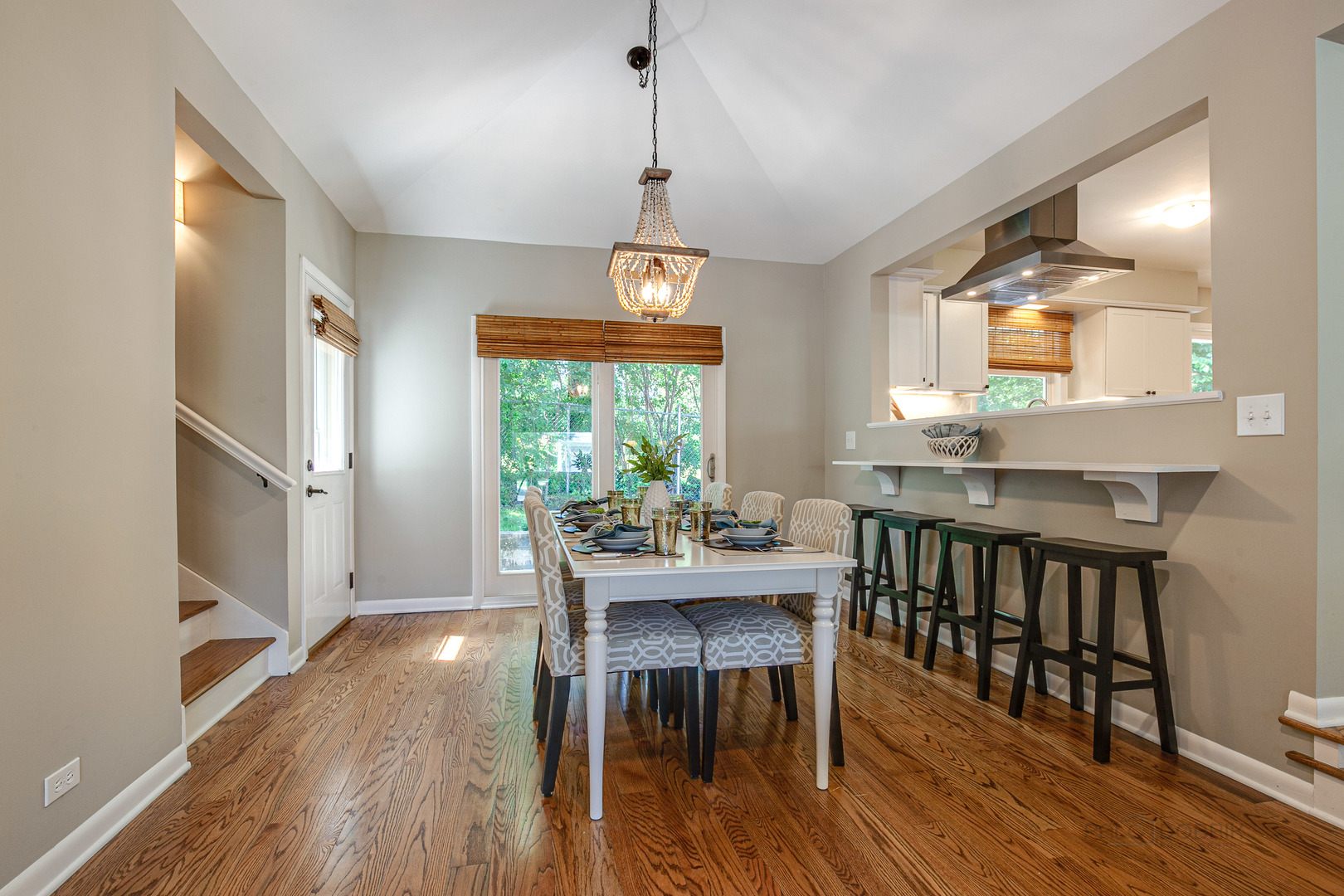 235 Waverly Road Barrington, IL 60010 - Photo 8 of 26 a view of a dining room with furniture window and wooden floor