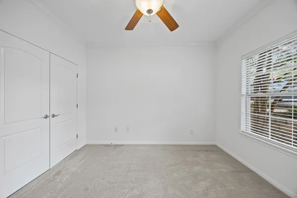 a view of a room that has a window in it