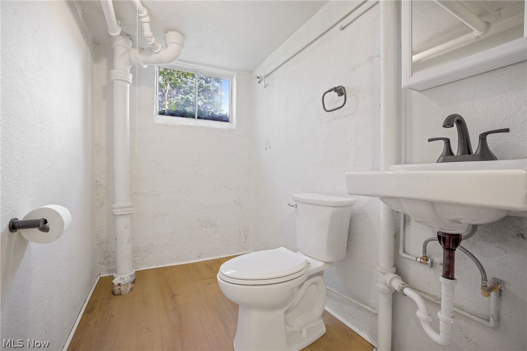 154 Winchester Road Akron, OH 44333 - Photo 25 of 26 Bathroom with toilet and wood-type flooring
