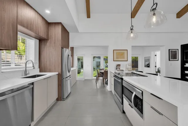 a living room with a couch and a flat screen tv