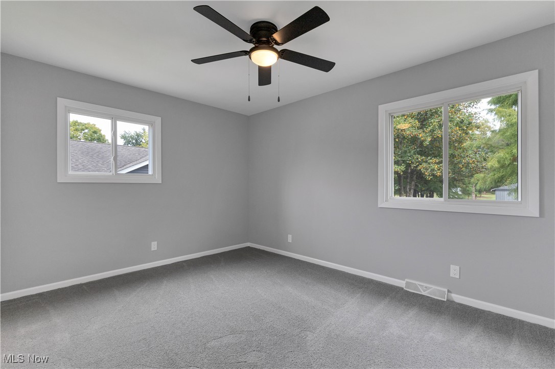 3071 Call Road Stow, OH 44224 - Photo 13 of 25 Unfurnished room with carpet floors and ceiling fan
