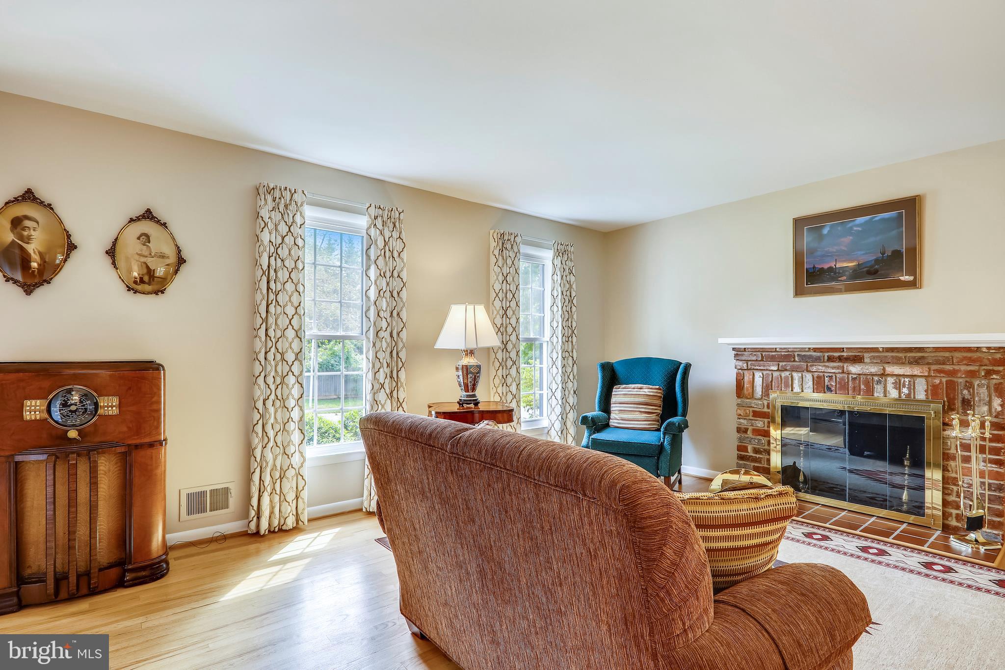 1804 Hopefield Road Silver Spring, MD 20905 - Photo 3 of 39 Living Room includes wood burning fireplace