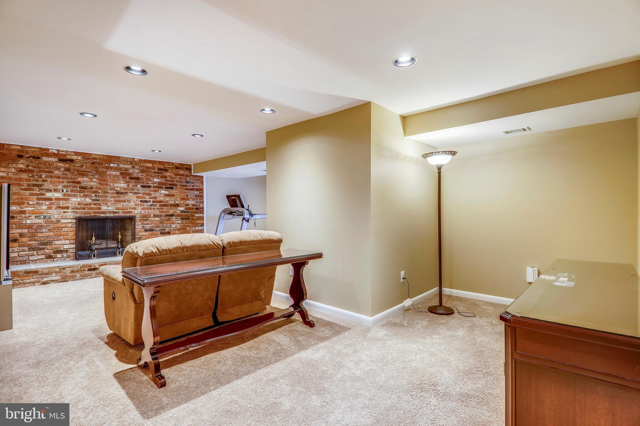 1804 Hopefield Road Silver Spring, MD 20905 - Photo 32 of 39 Game Room - floor to ceiling brick fireplace