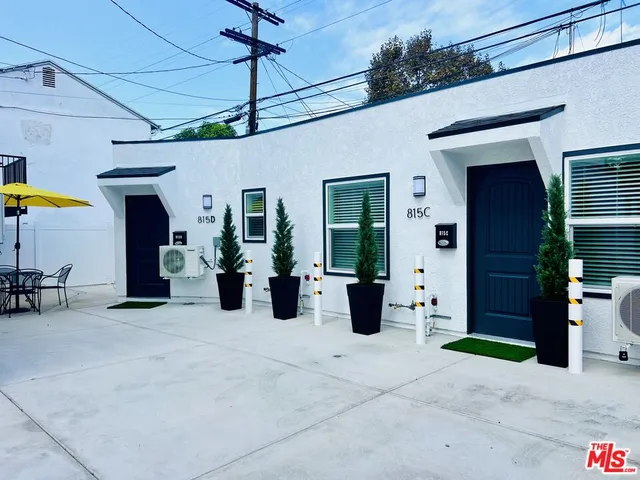 a view of a porch with seating space