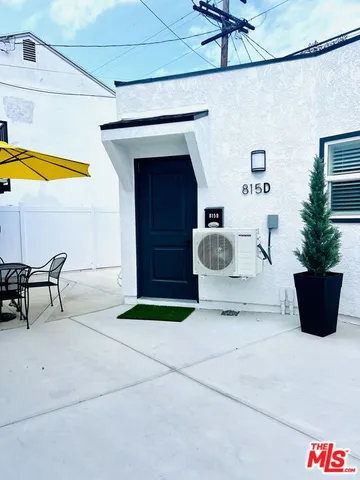 a room with a table and chairs