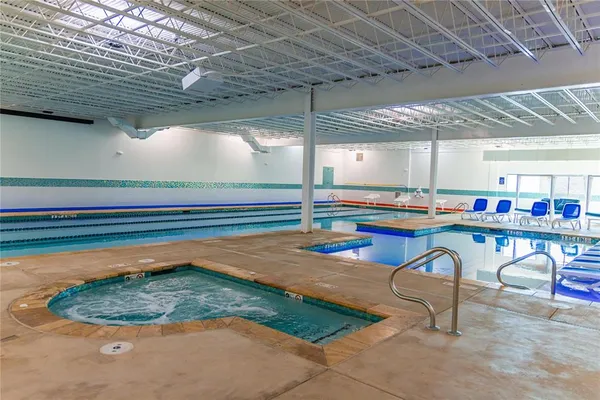 a room with lots of table and chairs