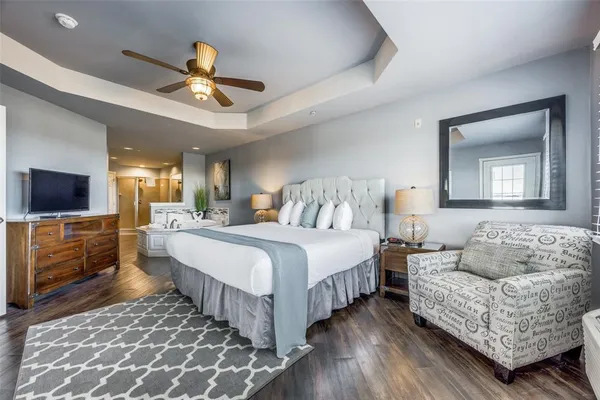 a bedroom with a bed and a couch