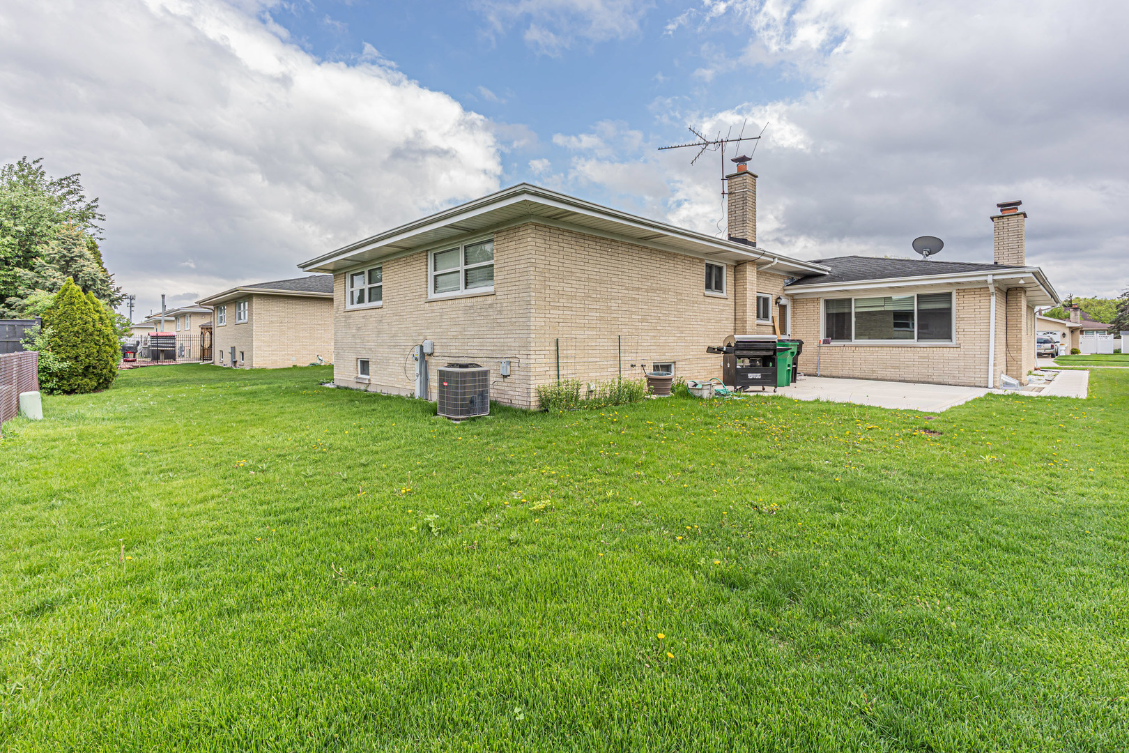 11020 Raleigh Street Westchester, IL 60154 - Photo 27 of 27 a big house with a big yard and more windows