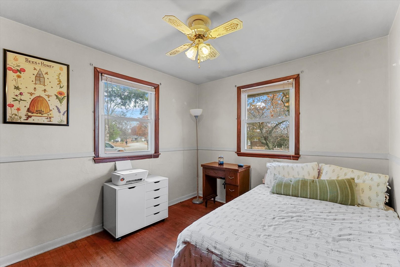 2213 Roland Drive Champaign, IL 61821 - Photo 14 of 21 a bedroom with a bed and a table in it