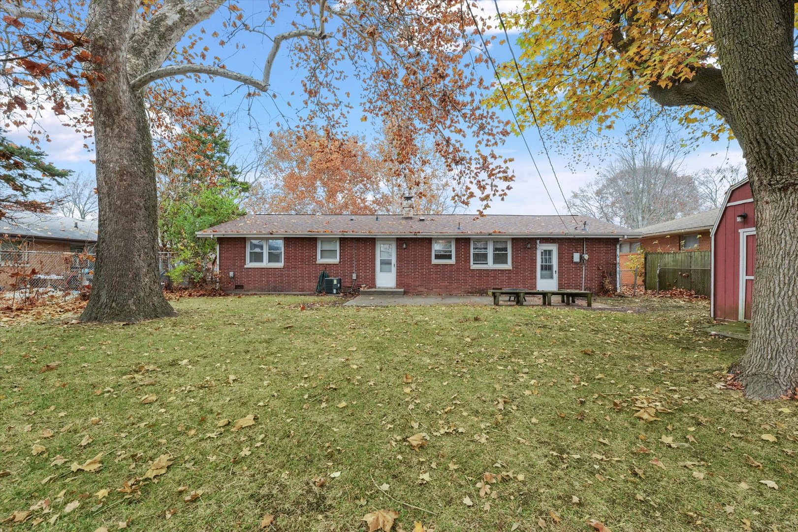 2213 Roland Drive Champaign, IL 61821 - Photo 19 of 21 a front view of a house with a garden
