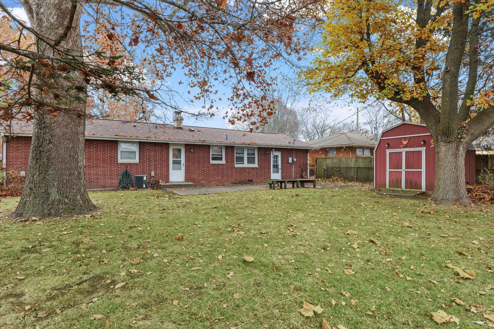 2213 Roland Drive Champaign, IL 61821 - Photo 20 of 21 a view of a house with a yard