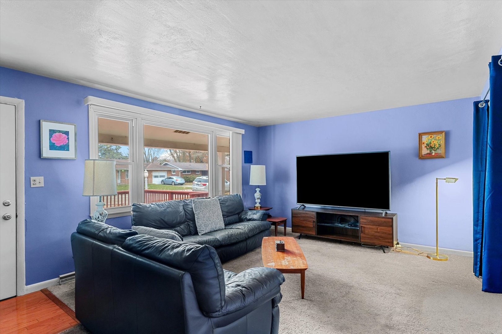 2213 Roland Drive Champaign, IL 61821 - Photo 4 of 21 a living room with furniture and a flat screen tv