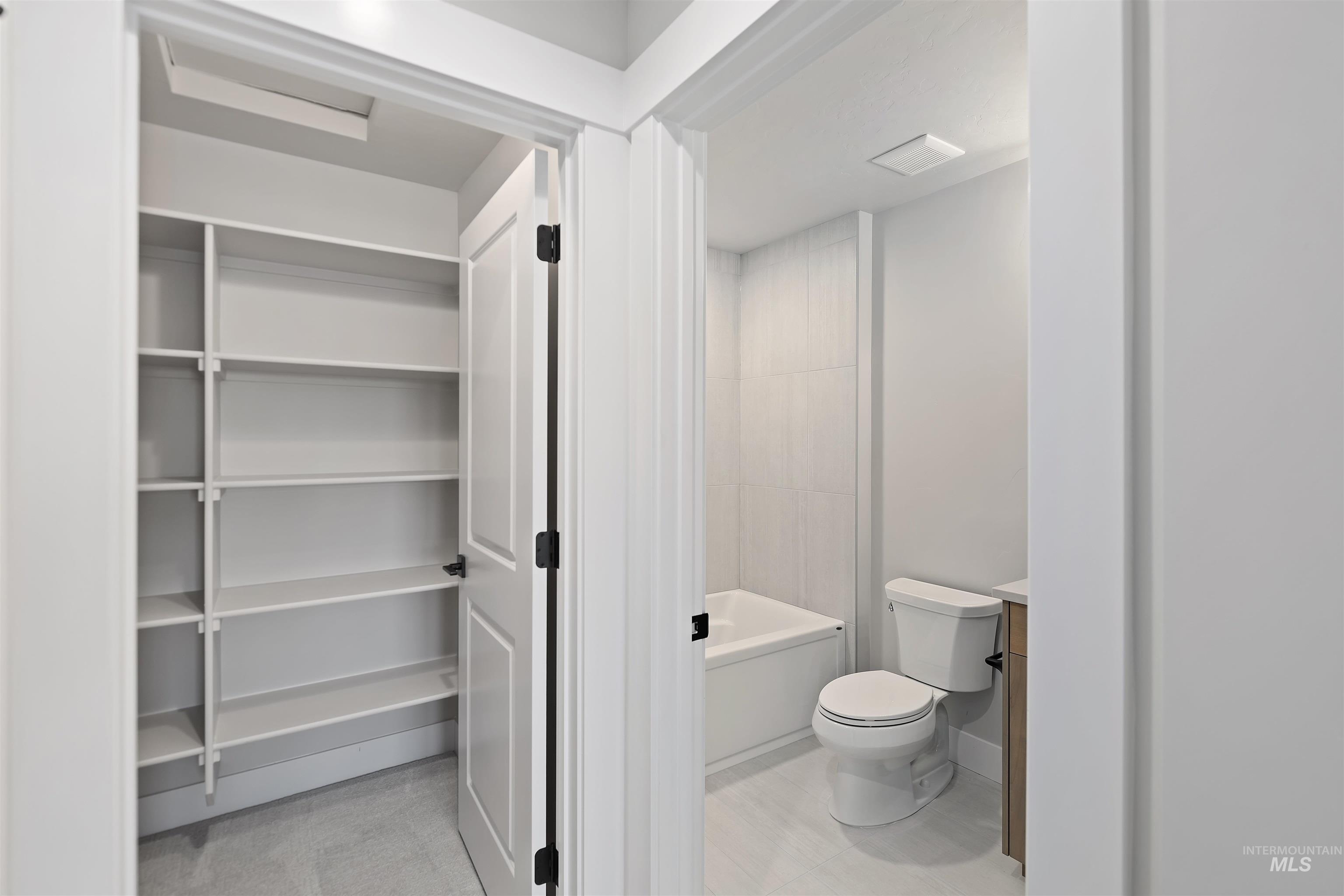 2247 East Blakehurst Street Kuna, ID 83634 - Photo 24 of 27 Bathroom with toilet and a tub in Bonus Room