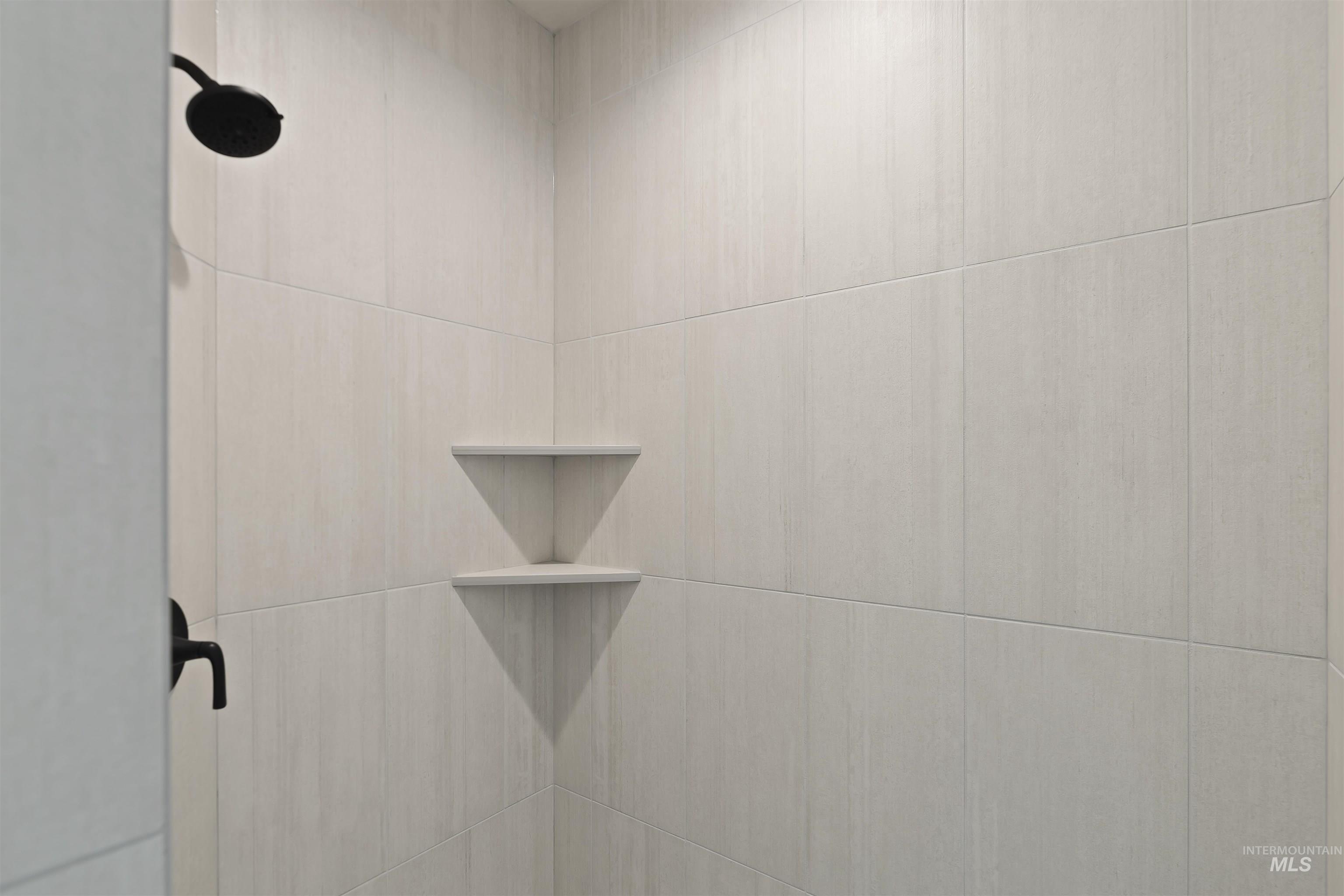 2247 East Blakehurst Street Kuna, ID 83634 - Photo 10 of 27 Bathroom view of a tile shower