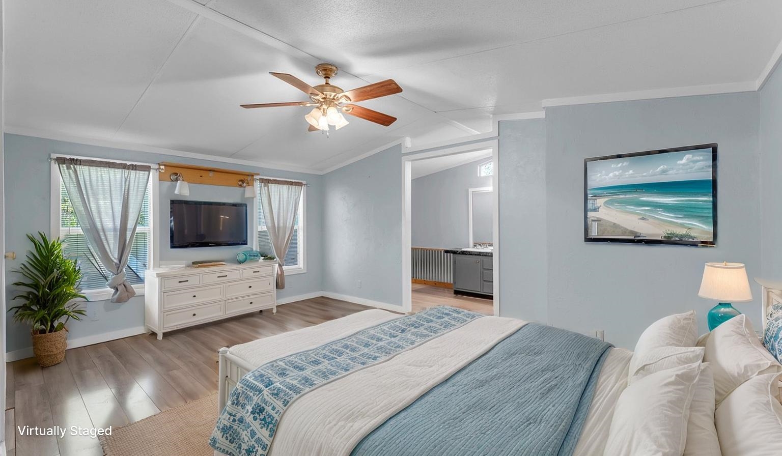 12409 Ranch Road 2341 Burnet, TX 78611 - Photo 5 of 16 a bedroom with a bed and a chandelier