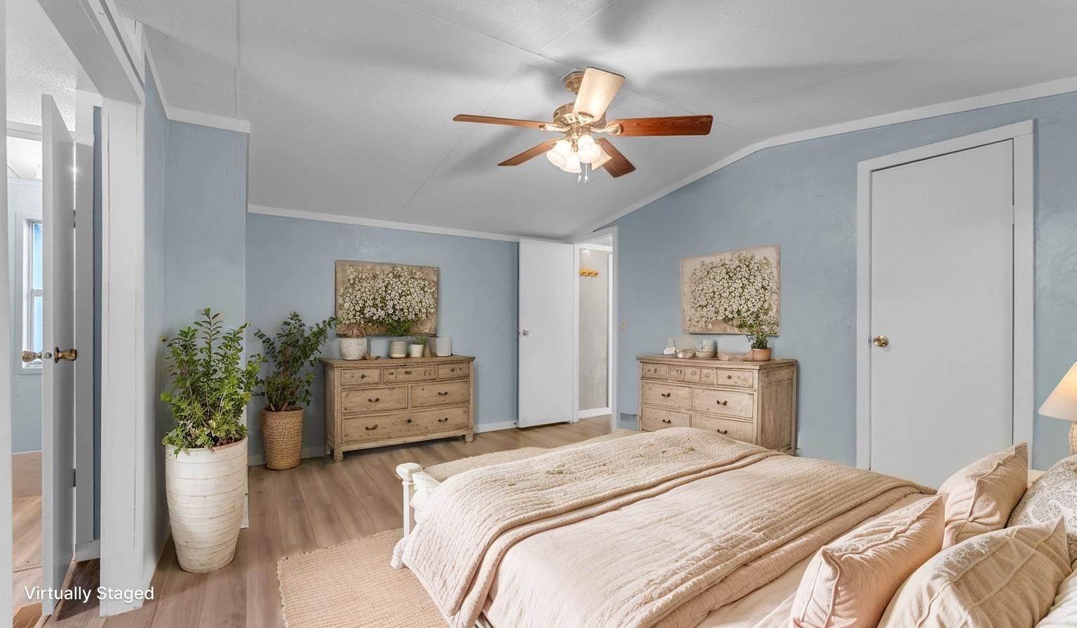 12409 Ranch Road 2341 Burnet, TX 78611 - Photo 8 of 16 a bedroom with a bed and a chandelier
