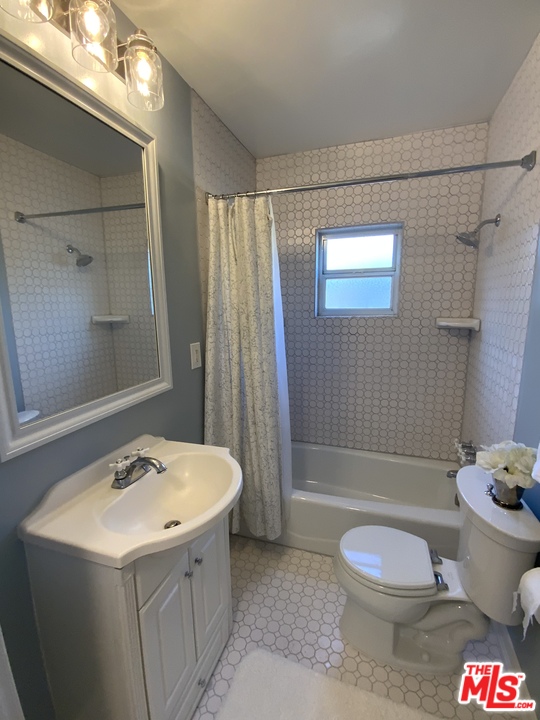3969 Alla Road Los Angeles, CA 90066 - Photo 13 of 28 a bathroom with a sink toilet and shower