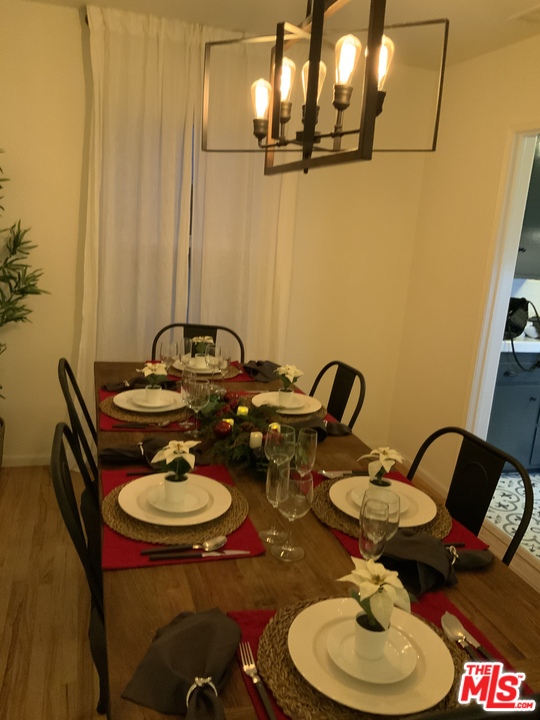 3969 Alla Road Los Angeles, CA 90066 - Photo 23 of 28 a table and chairs in a room