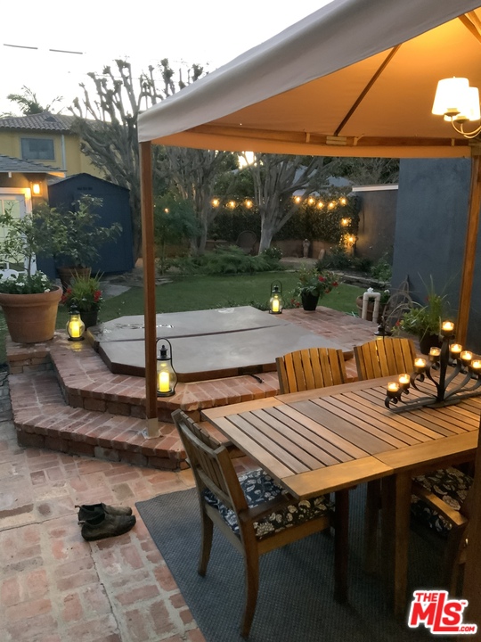 3969 Alla Road Los Angeles, CA 90066 - Photo 26 of 28 a view of a patio with table and chairs with wooden floor and fence