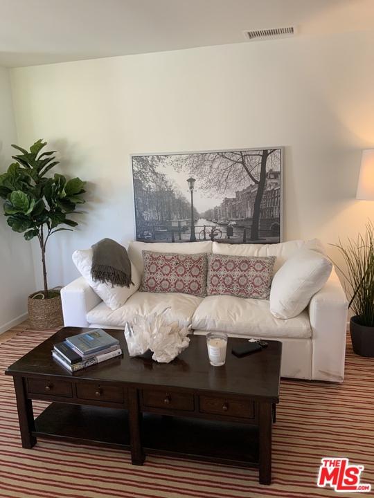 3969 Alla Road Los Angeles, CA 90066 - Photo 4 of 28 a living room with furniture and a potted plant