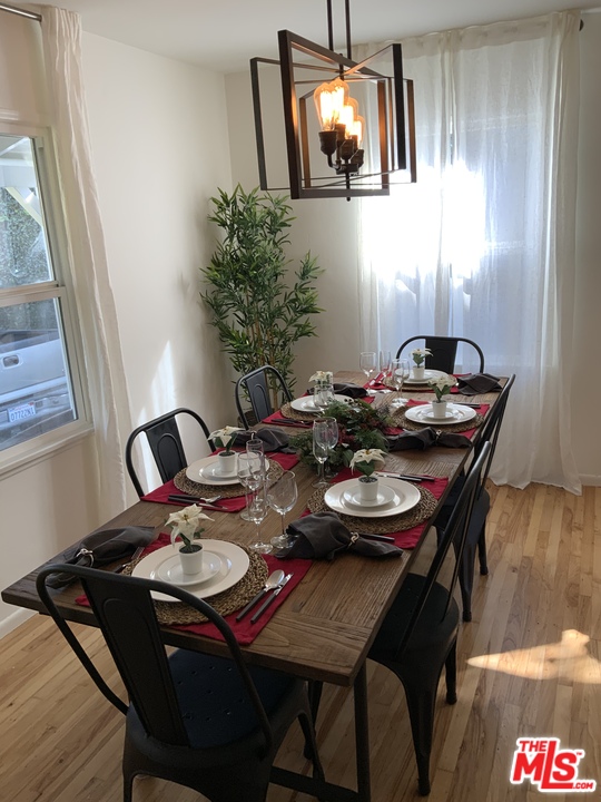 3969 Alla Road Los Angeles, CA 90066 - Photo 5 of 28 a table that has a table and chairs in it