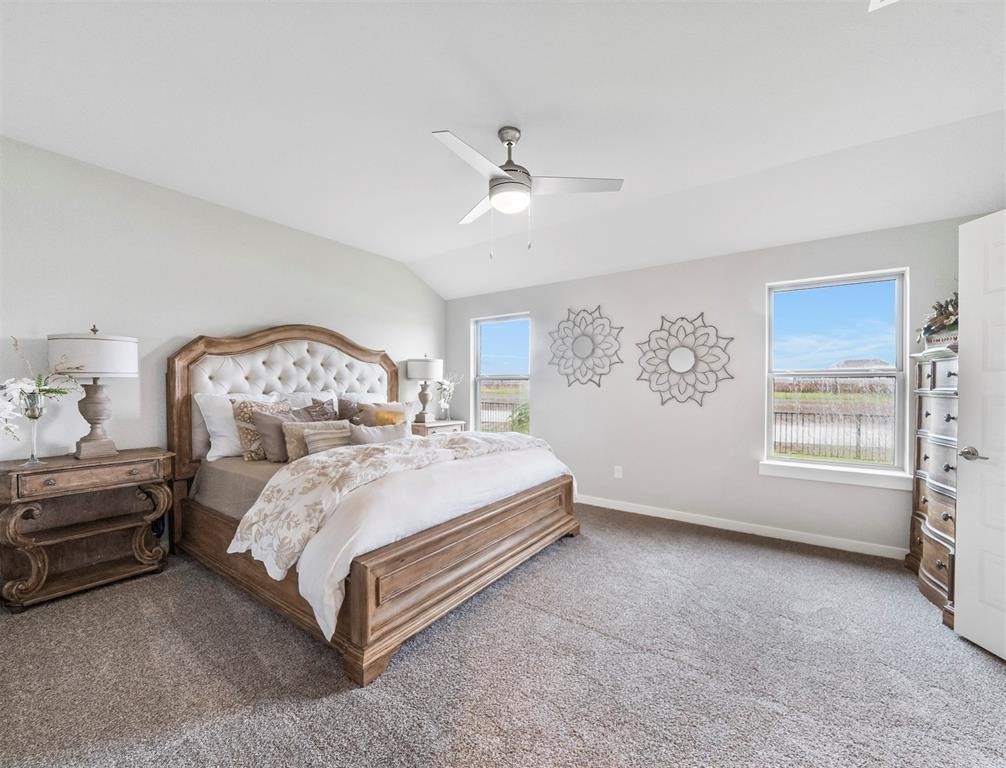 7922 Brumbly Lane Rosharon, TX 77583 - Photo 11 of 17 a spacious bedroom with a bed and a window