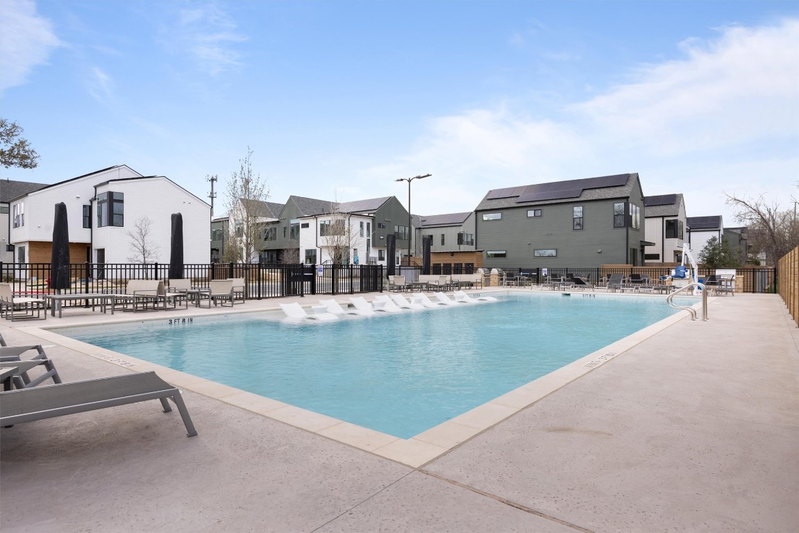 3613 Jetson Way, Unit 1102 Austin, TX 78723 - Photo 2 of 26 Community pool with a residential view and a patio