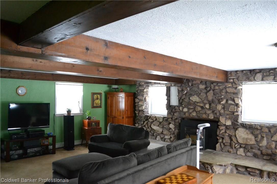 4530 Timber Lane Dryden, MI 48428 - Photo 24 of 36 Stone Fireplace