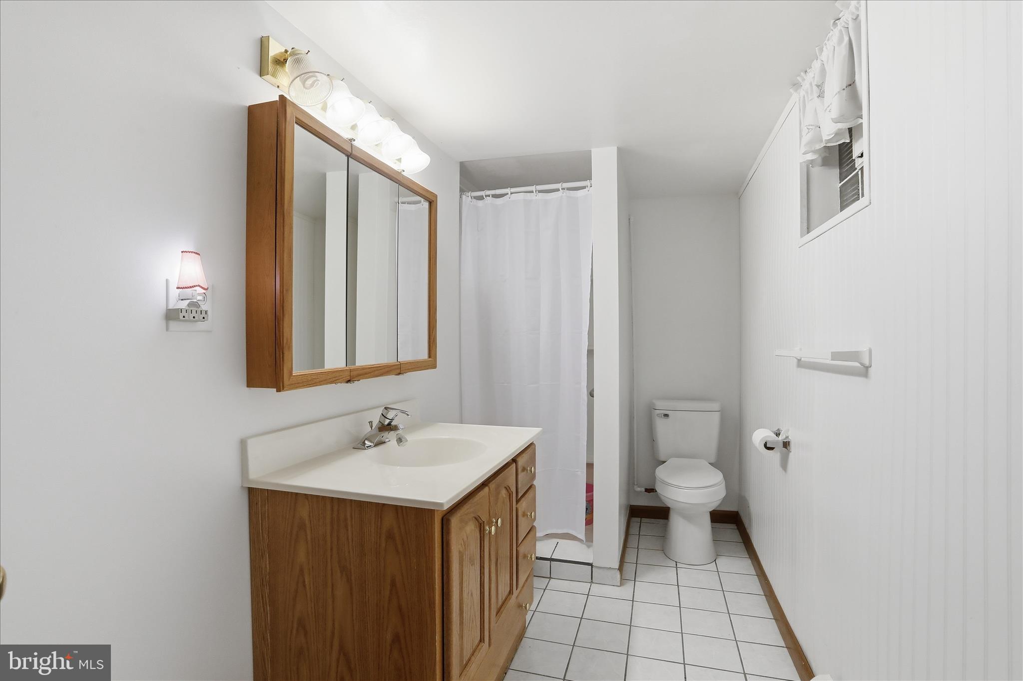 199 Buser Street Ridgeley, WV 26753 - Photo 29 of 49 a bathroom with a sink toilet and shower