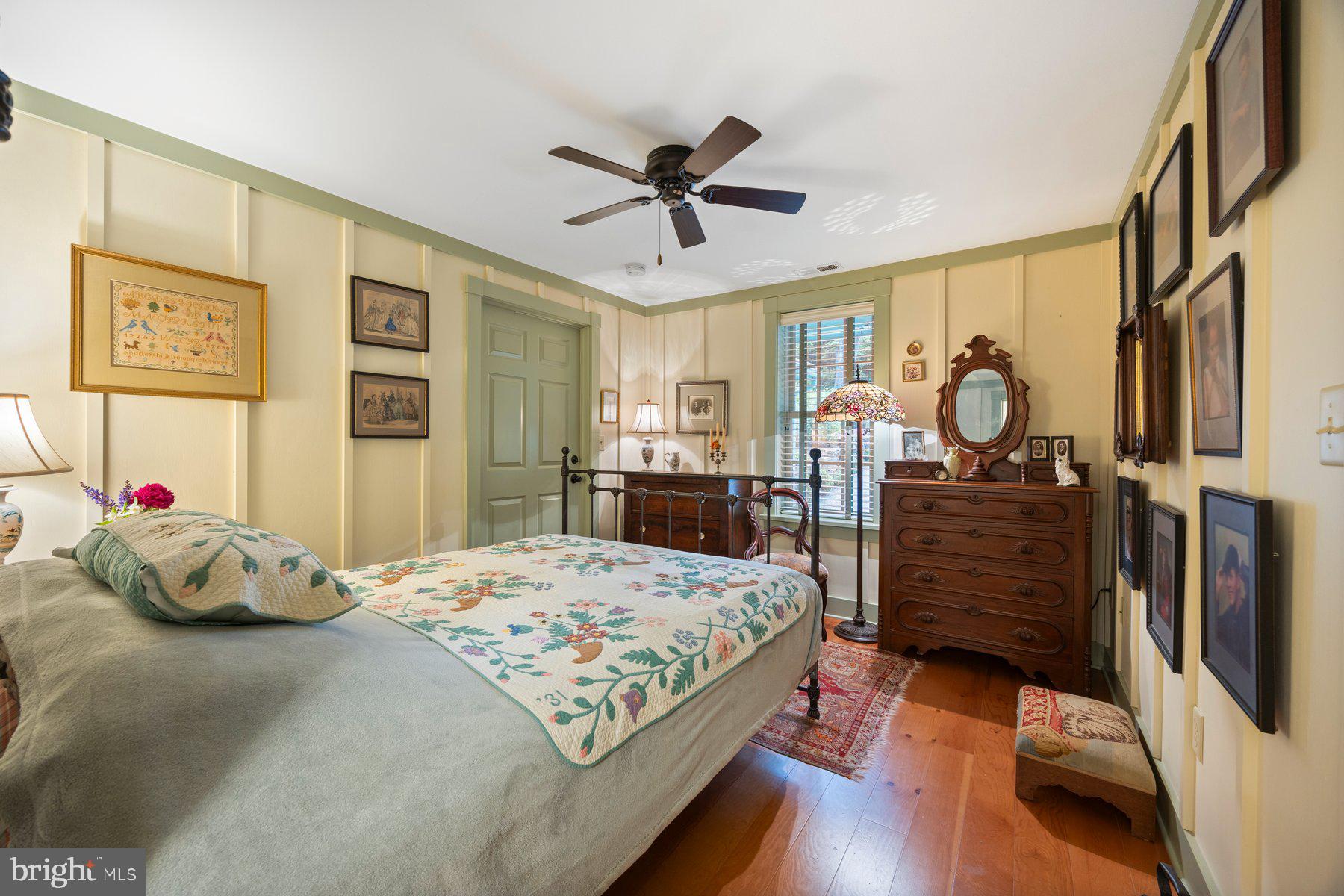 13704 Bardon Road Phoenix, MD 21131 - Photo 29 of 88 a bedroom with a bed and wooden floor
