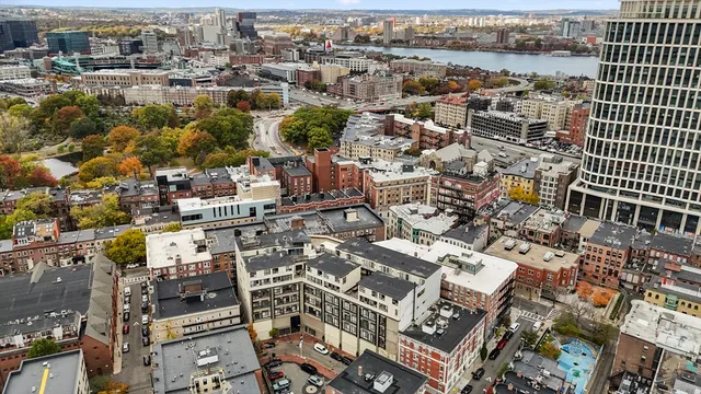 an aerial view of a city with streets and houses