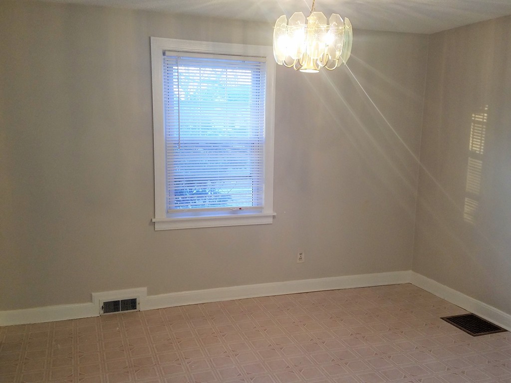 1763 Carew Street Springfield, MA 01104 - Photo 3 of 15 an empty room with a window