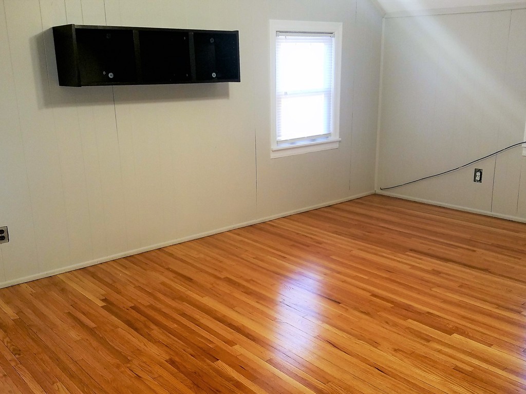 1763 Carew Street Springfield, MA 01104 - Photo 7 of 15 a view of empty room with wooden floor