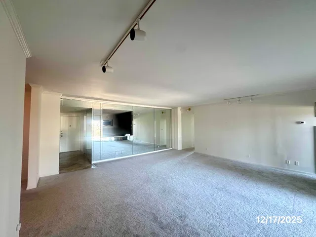 a bathroom with a tub a toilet sink shower and mirror